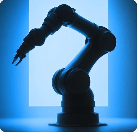 Industrial robot arm bathed in blue light